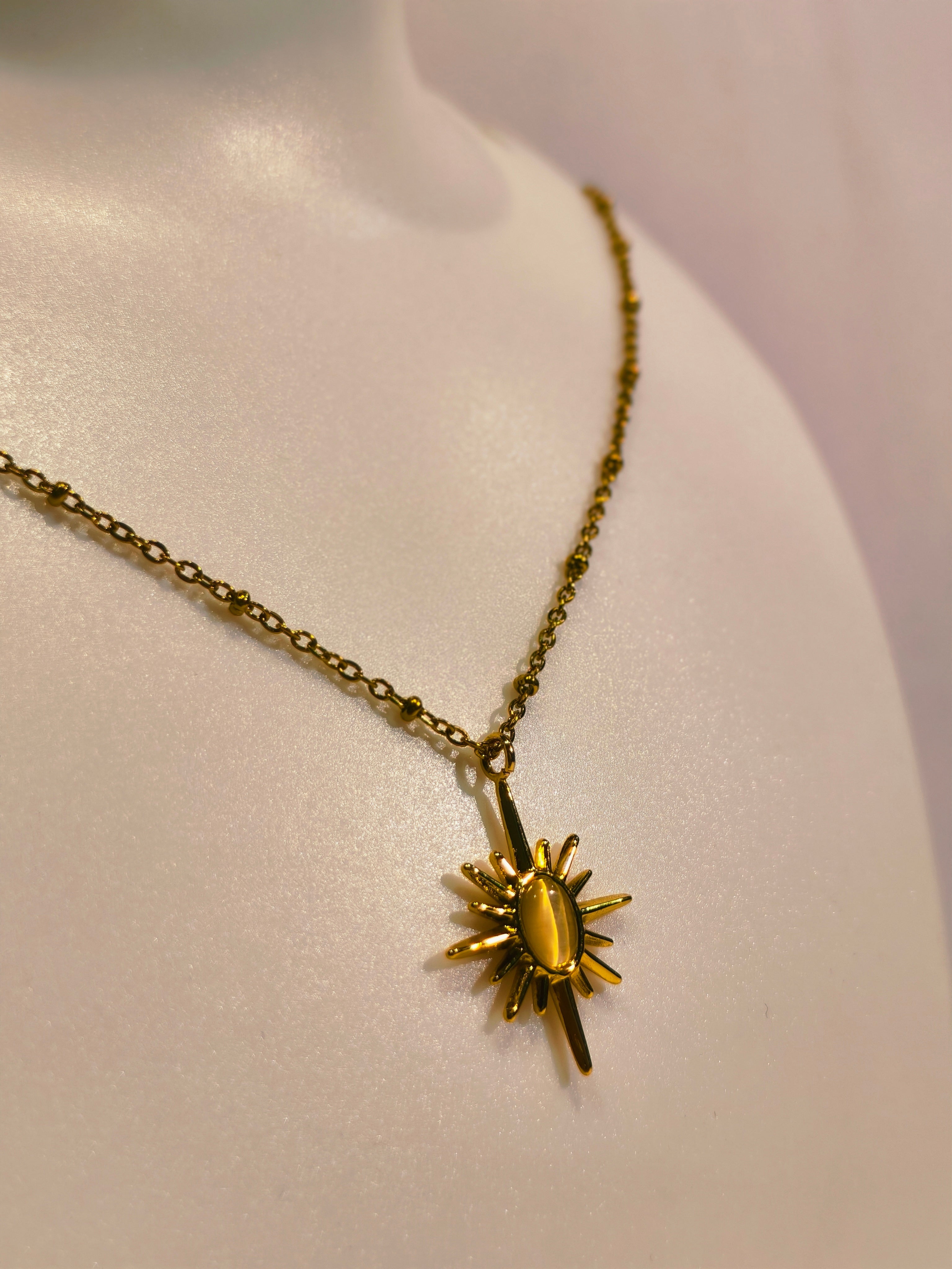 Roopsaj's "Celestial Sunburst" Gold Star Pendant Necklace | Golden Cat Eye Stone